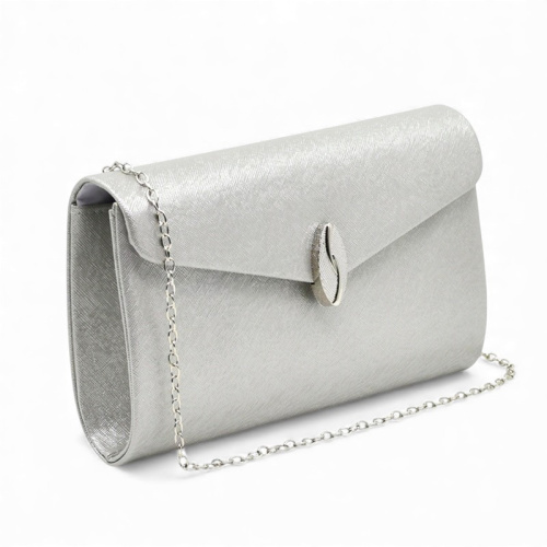 Клъч официална дамска чанта с ефектна катарама сребърен обков топ модел сребърна
